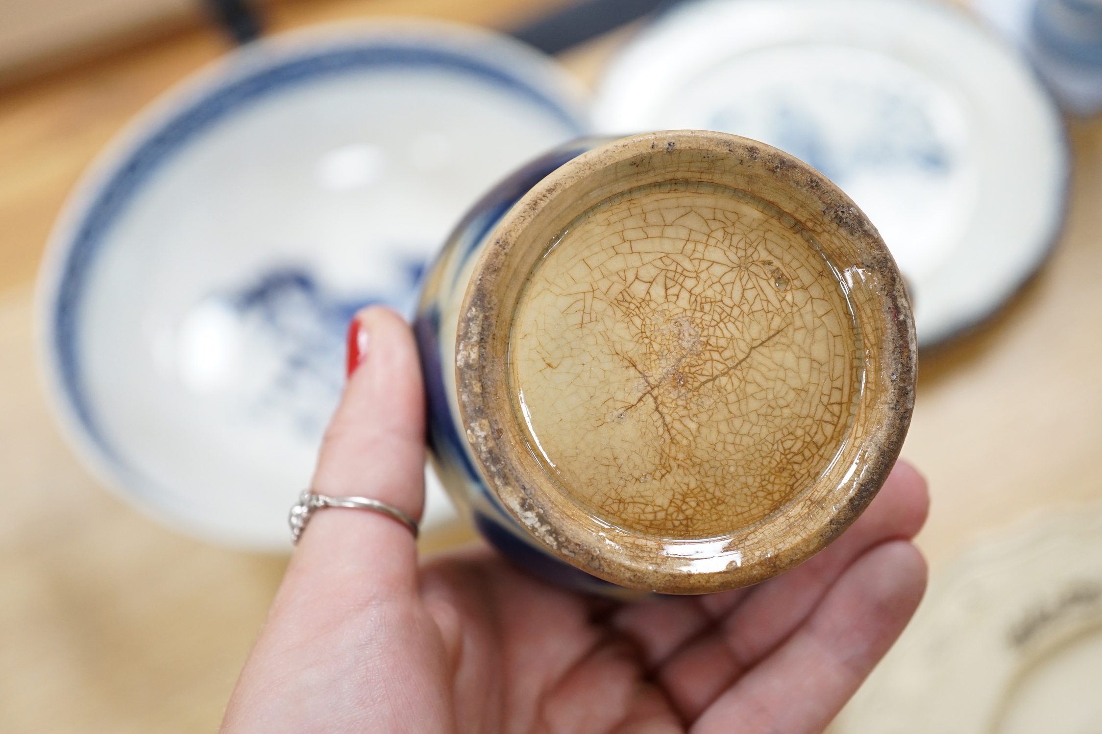 A collection of late 18th/early 19th century pearlware and creamware including three black transfer printed creamware plates, c.1780, blue and white bowls, plates, dishes and jug, the largest 27cm in diameter